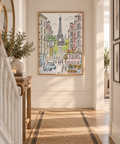 A framed art print depicting a Parisian street scene with the Eiffel Tower, hanging on a white wall in a bright, modern hallway with a woven runner rug.