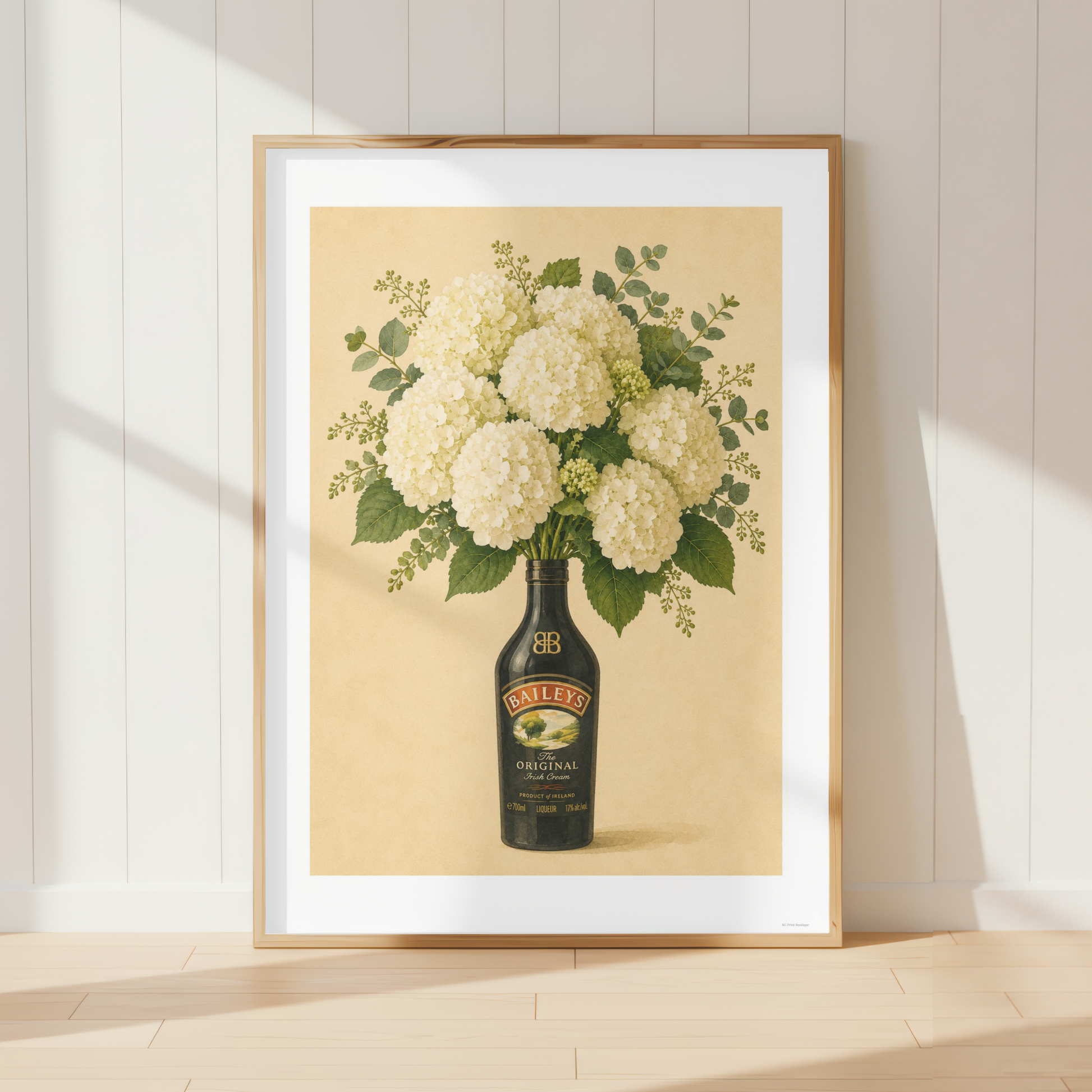 Vintage Baileys hydrangea wall art featuring cream floral bouquet and eucalyptus foliage in a rustic kitchen setting.