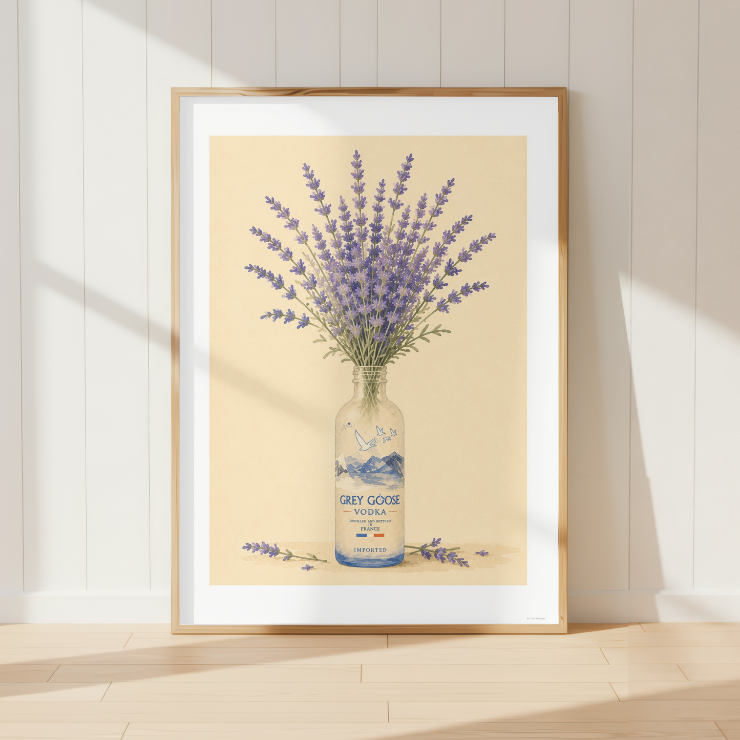 French country lavender wall art featuring a bouquet of purple lavender flowers arranged in a Grey Goose bottle. Rustic botanical print inspired by Provence and farmhouse kitchen décor.