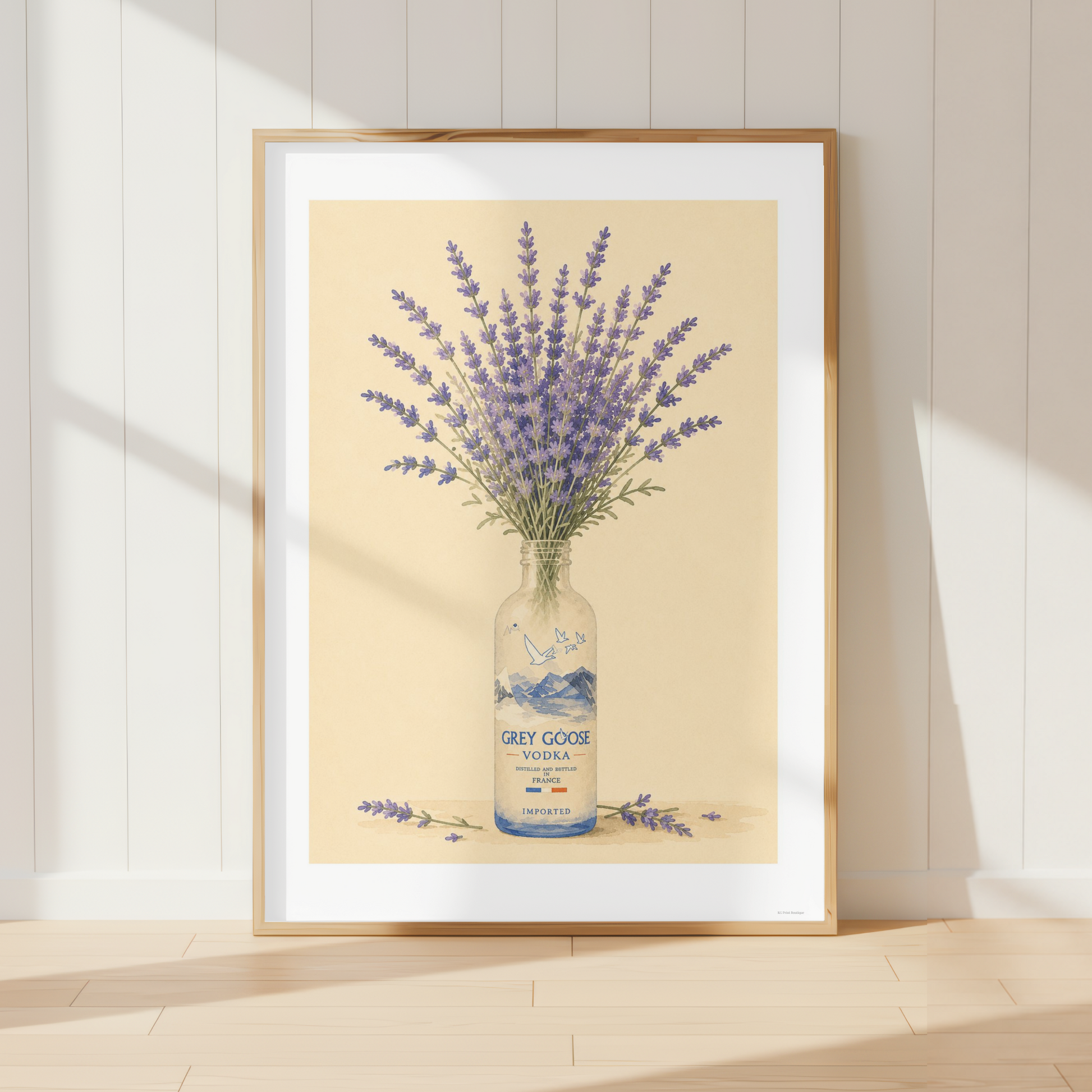 French country lavender wall art featuring a bouquet of purple lavender flowers arranged in a Grey Goose bottle. Rustic botanical print inspired by Provence and farmhouse kitchen décor.