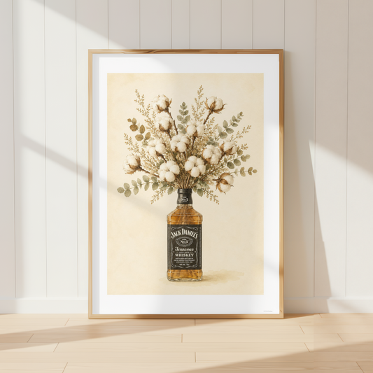 Rustic Jack Daniels wall art featuring a bouquet of soft cotton stems and eucalyptus arranged in a whiskey bottle. Neutral farmhouse botanical print perfect for country kitchens and dining rooms.