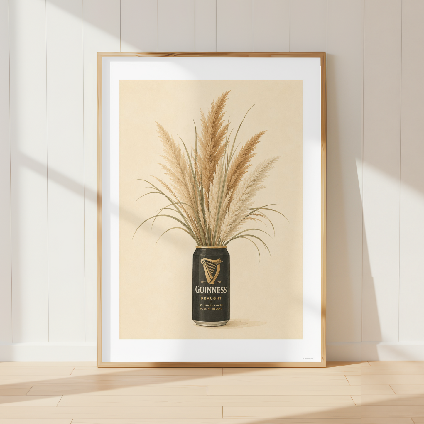 Vintage Guinness Pampas Grass wall art featuring neutral botanical stems in a rustic farmhouse kitchen.