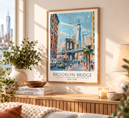 A framed art print of a vintage-style Brooklyn Bridge in New York hangs on a beige wall in a beautifully styled room. The print features a colorful illustration of the bridge, historic buildings, and street scenes with yellow cabs.