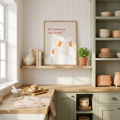 Funny Did Someone Say Snack goose wall art styled in a neutral kitchen