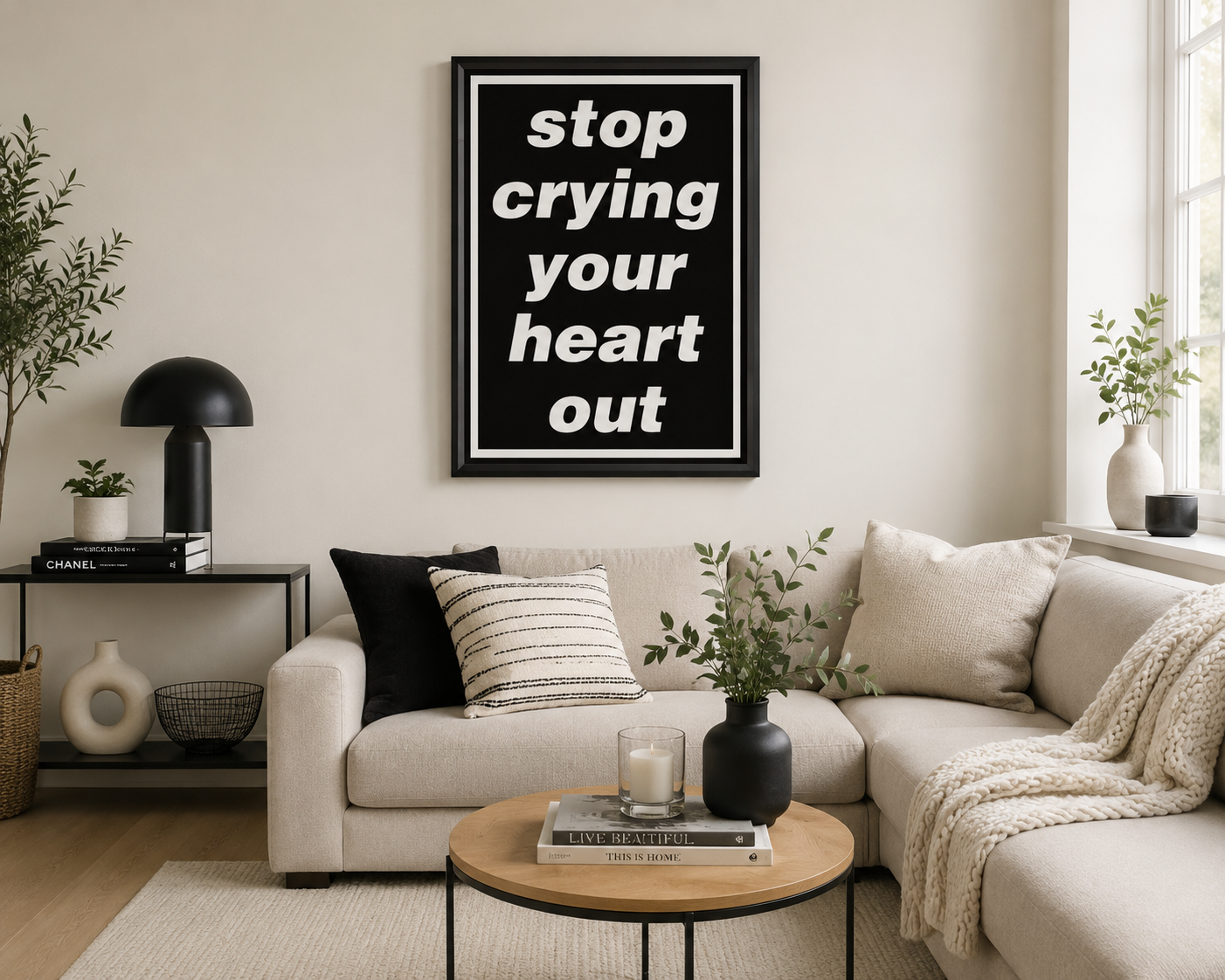 Stop Crying Your Heart Out lyric wall art displayed above a modern home with Scandinavian-inspired décor.