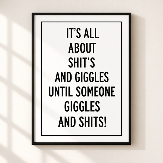 Shits and Giggles funny quote typography print in a thin black frame on a warm ivory wall with minimalist monochrome styling