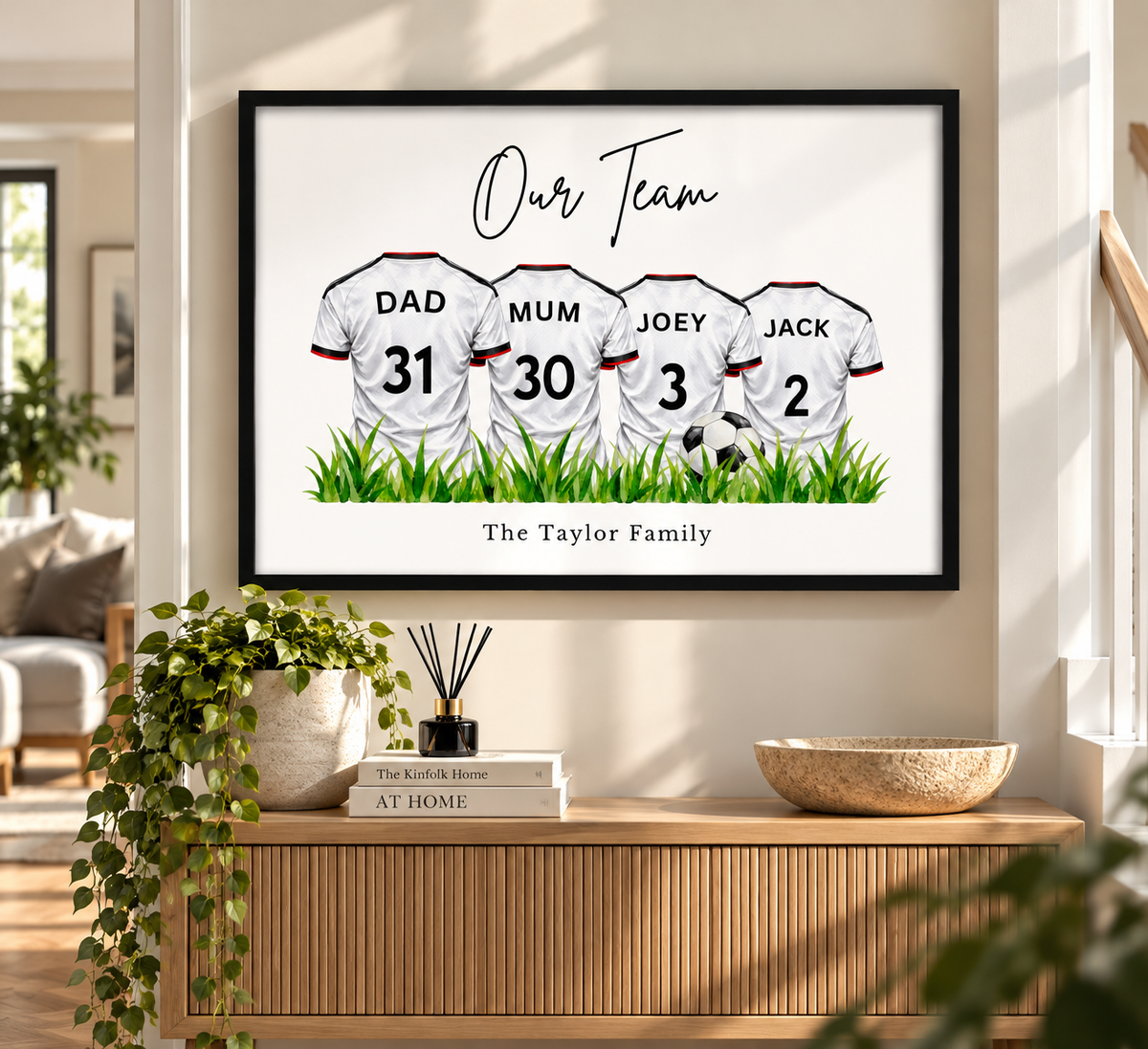 Personalised Fulham inspired family football print with four white football shirts, custom names and numbers, Our Team heading and Taylor Family wording in black frame