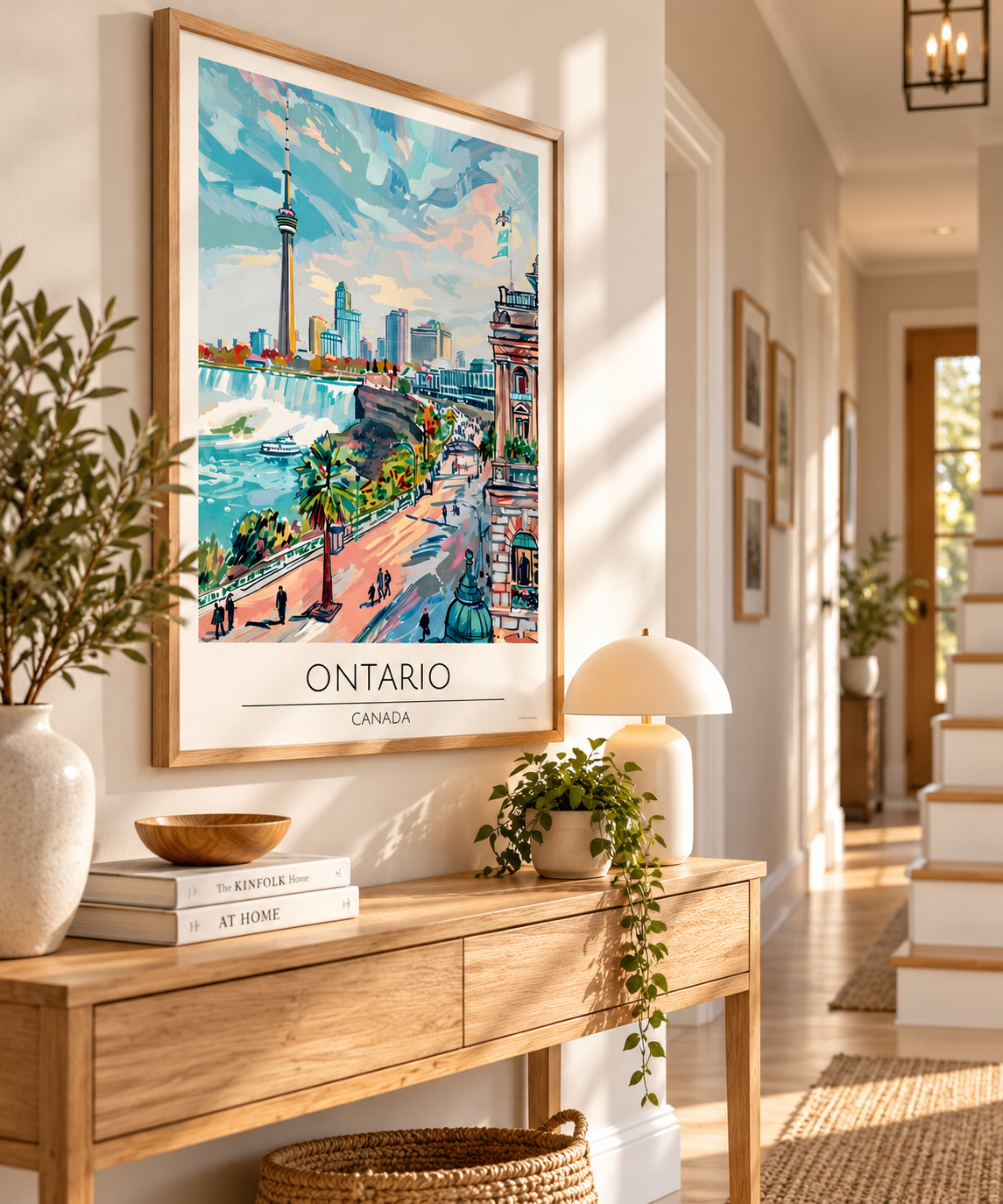 Ontario Canada travel poster featuring a colourful illustrated skyline, turquoise waterfront and pastel architecture in a light oak frame.