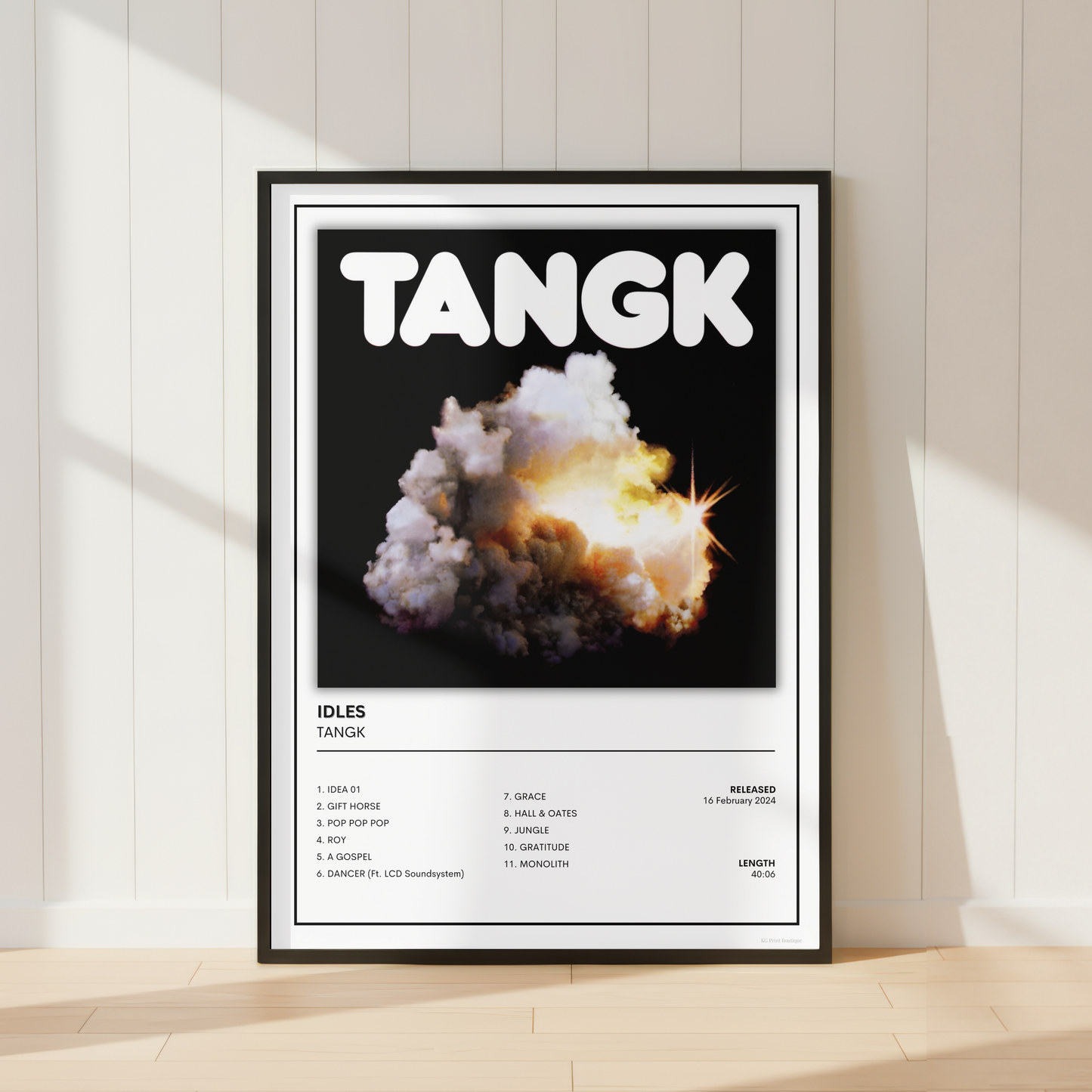 IDLES TANGK album cover print displayed in a minimalist modern home interior.