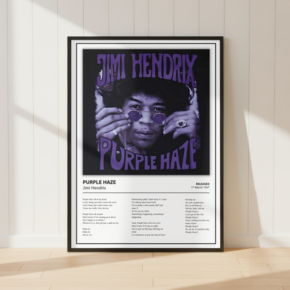 A framed Jimi Hendrix 'Purple Haze' poster leaning against a white paneled wall on a light wood floor, with soft sunlight casting shadows across the scene.