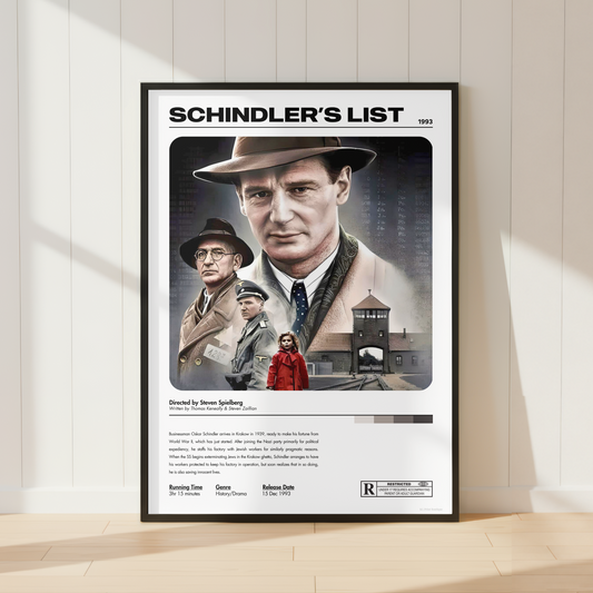 A framed 'Schindler's List' movie poster leaning against a white paneled wall on a light wood floor, with soft sunlight casting shadows across the scene.