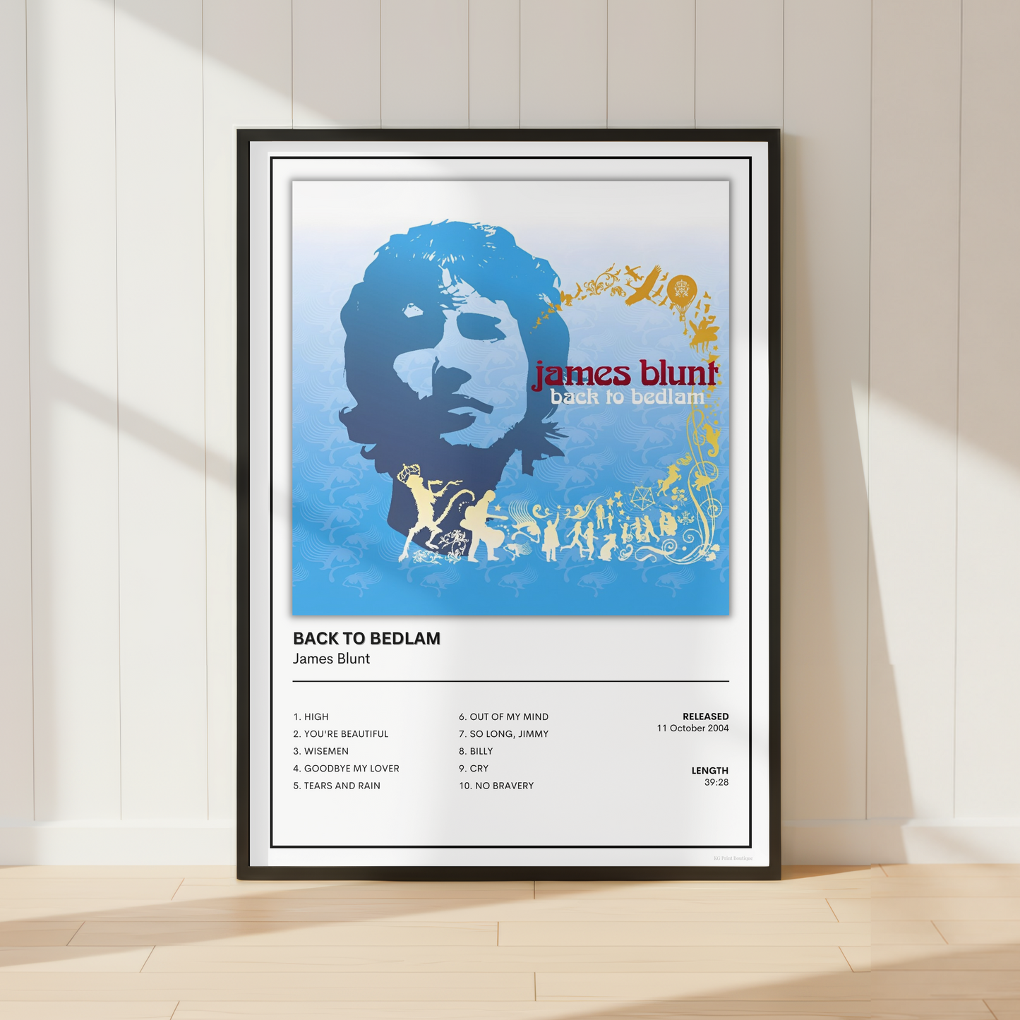 James Blunt Back to Bedlam album tracklist poster displayed in a modern bedroom with a wooden dresser, record player, acoustic guitar and contemporary music-inspired décor.