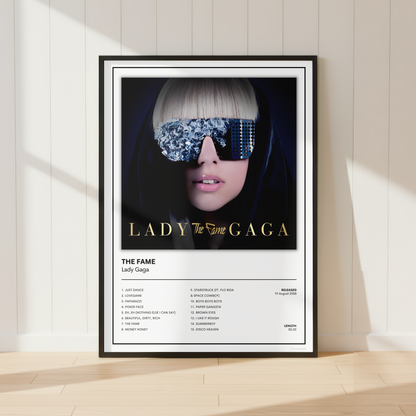 Lady Gaga The Fame album tracklist print in black frame featuring iconic debut album artwork and complete song listing for modern music wall decor.