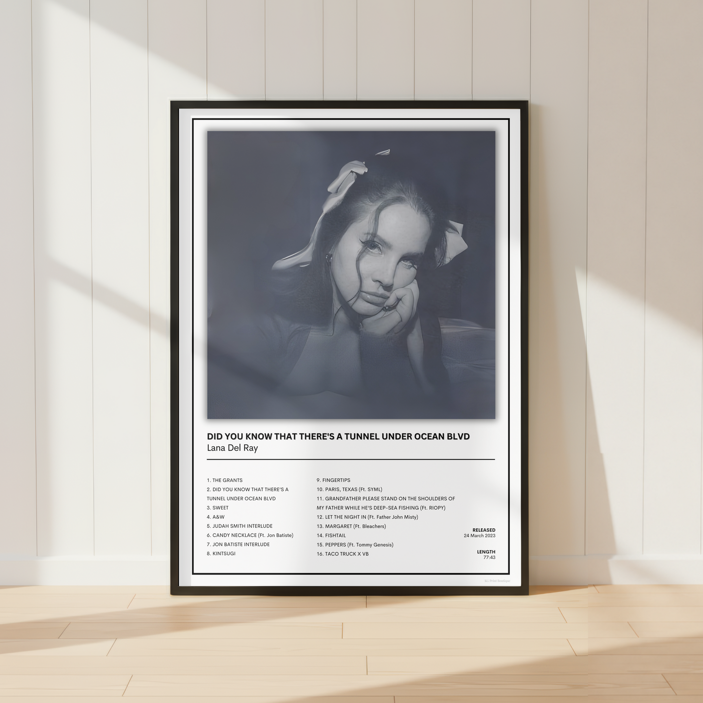 Lana Del Rey Did You Know That There's a Tunnel Under Ocean Blvd album print displayed in a black frame with a white mount.