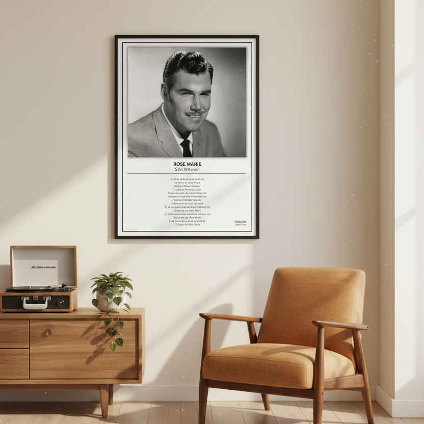 A framed black-and-white portrait print of Rose Marie as Slim Whitman leaning against a white paneled wall on a light wood floor. The print includes a black frame, a black-and-white photo, the name and role, and a block of small text below.