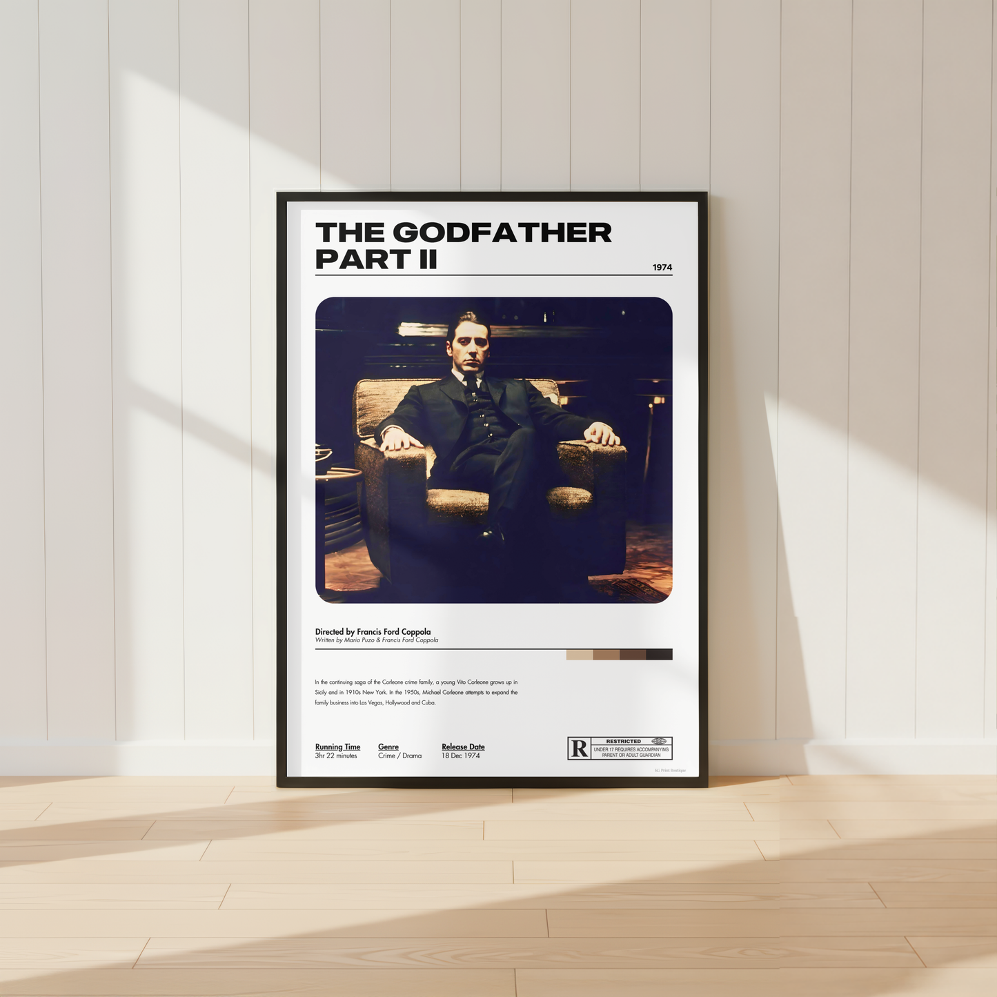 Minimalist The Godfather Part II movie poster print in a black frame styled in a modern neutral interior.