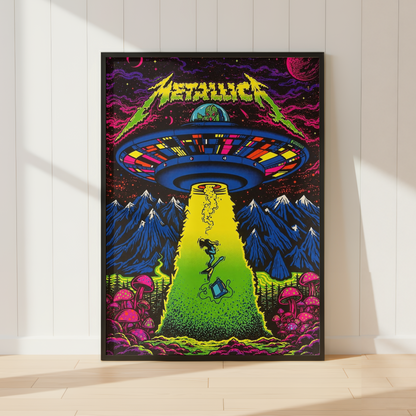 Metallica 'The Metal Era' poster leaning against a white paneled wall on a light wood floor. The poster features a vibrant, psychedelic illustration of a UFO releasing a beam of light over a green field with a figure, pink mushrooms, and blue mountains.