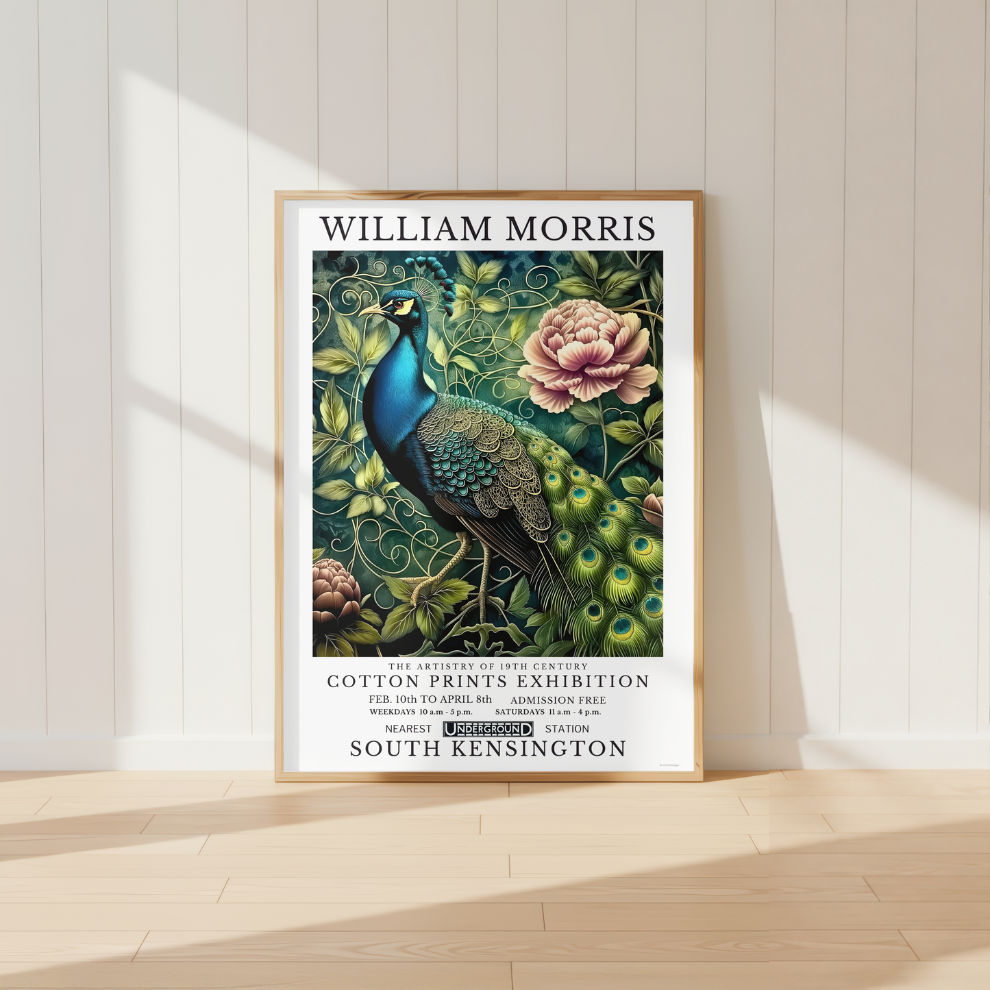 William Morris peacock print featuring detailed botanical foliage and vintage floral artwork in a light oak frame.