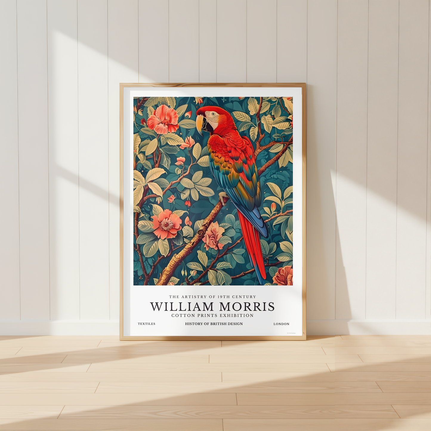 William Morris inspired parrot wall art displayed above a natural oak sideboard in a neutral living room, featuring a vibrant scarlet macaw surrounded by botanical flowers and foliage.