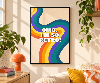 A framed retro-style wall art print hangs on a beige wall in a sunlit living room. The print features bold white text reading “OMG, I'M SO RETRO!” over flowing rainbow-colored wavy lines on a cream background.