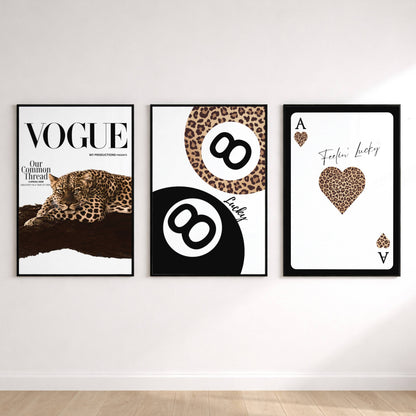Set of three luxury leopard wall art prints featuring Vogue typography, lucky number eight and ace playing card artwork.