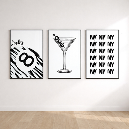 Luxury monochrome wall art featuring NY typography, martini illustration and lucky 8-ball graphics.